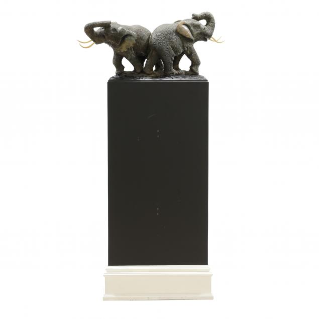 a-large-hardstone-carving-of-two-elephants-on-custom-stand