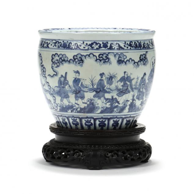 a-large-chinese-porcelain-blue-and-white-jardiniere-with-carved-wooden-stand