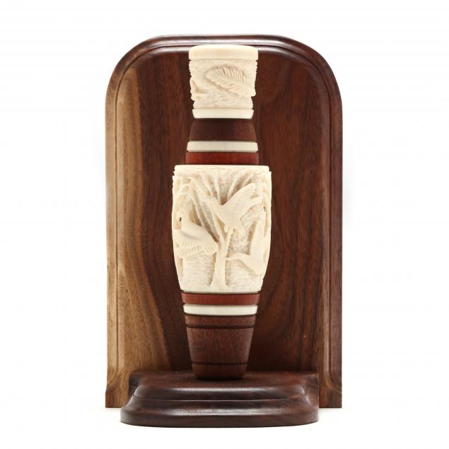 intricately-carved-bone-duck-call-with-base