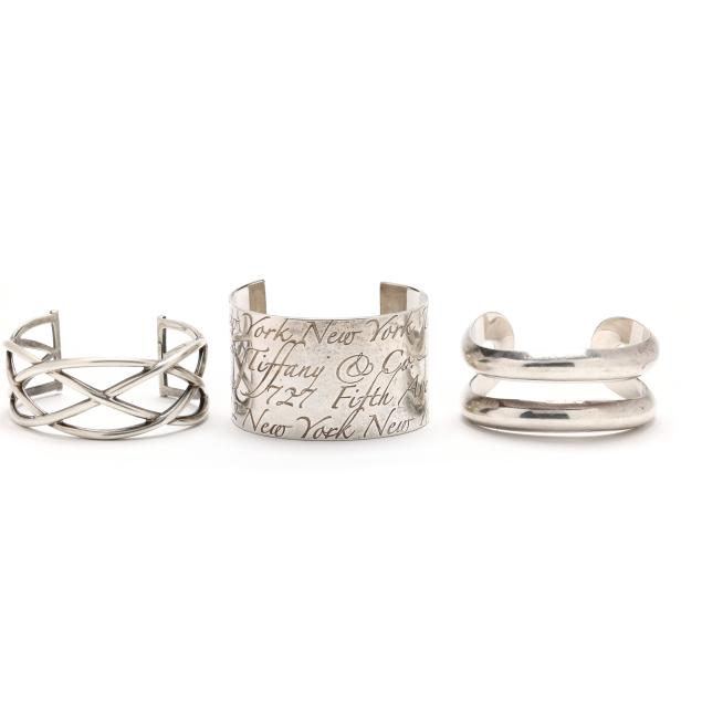 two-sterling-silver-cuff-bracelets-tiffany-co-and-a-sterling-silver-cuff-bracelet-elsa-peretti-for-tiffany-co