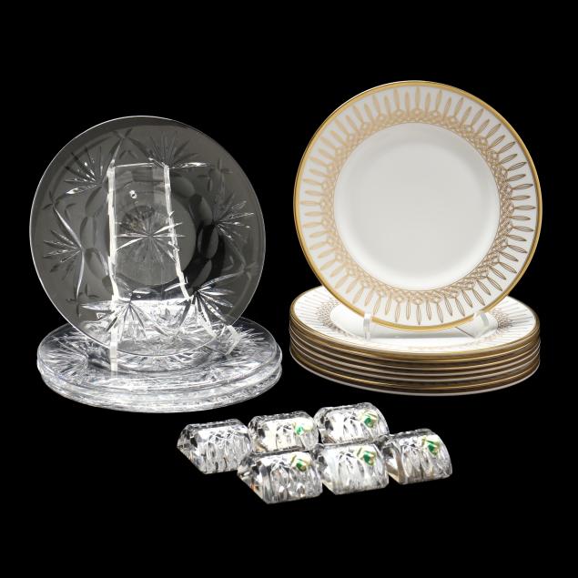 a-collection-of-waterford-plates-and-place-cards