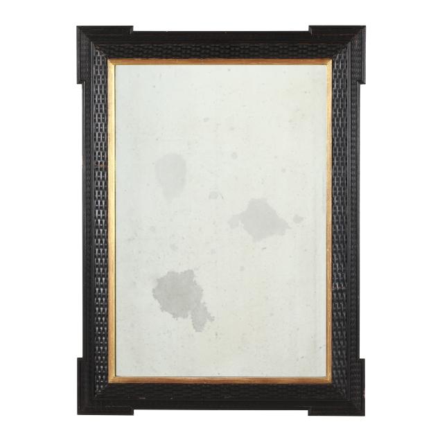 jacobean-style-carved-and-ebonized-mirror