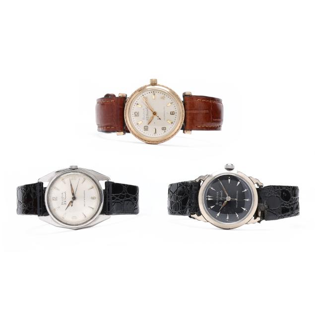 a-group-of-three-vintage-i-bulova-23-i-watches-bulova