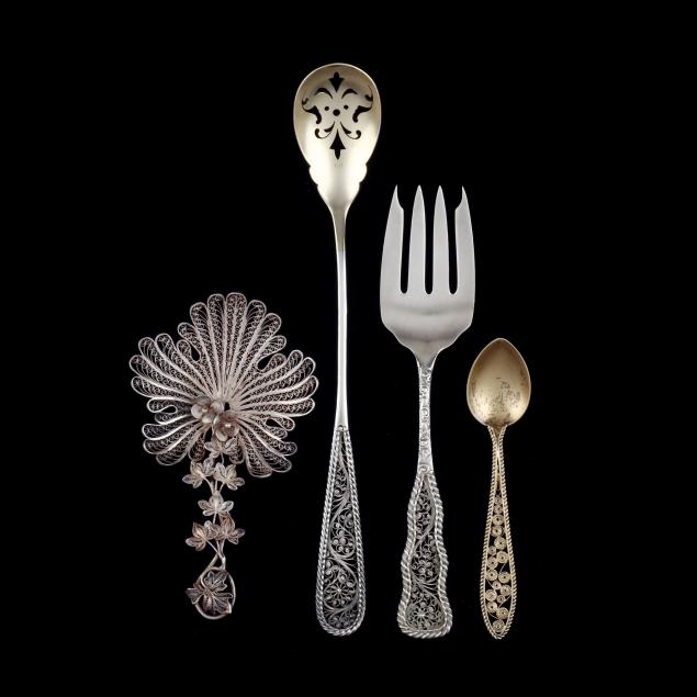 four-pieces-of-silver-filigree-flatware