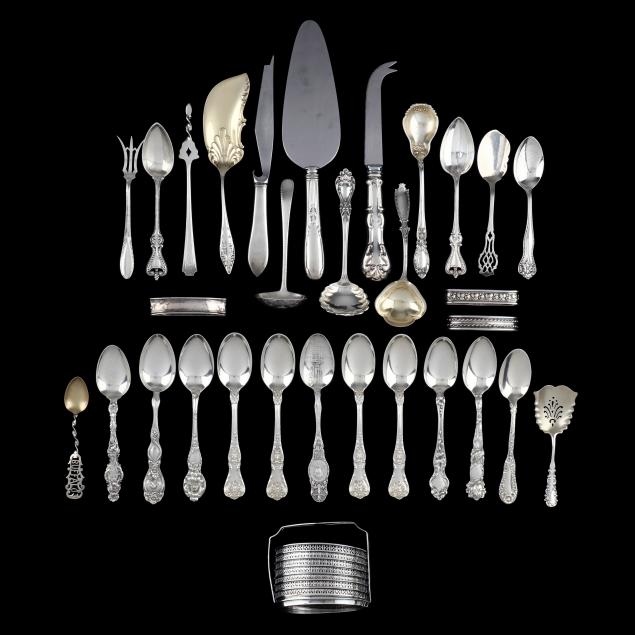 a-collection-of-sterling-silver-flatware-and-hostess-accessories