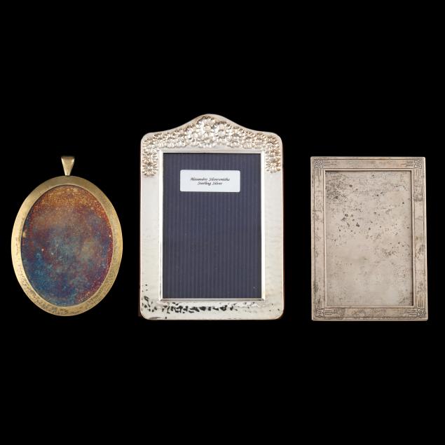 three-sterling-silver-picture-frames