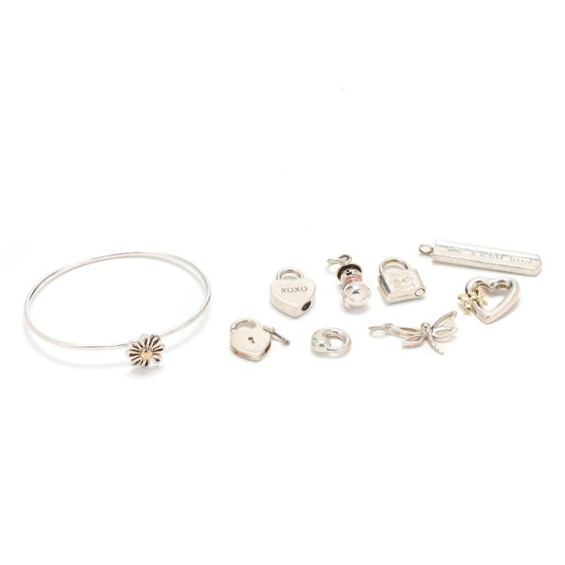 a-sterling-silver-bangle-bracelet-and-eight-sterling-silver-charms-tiffany-co