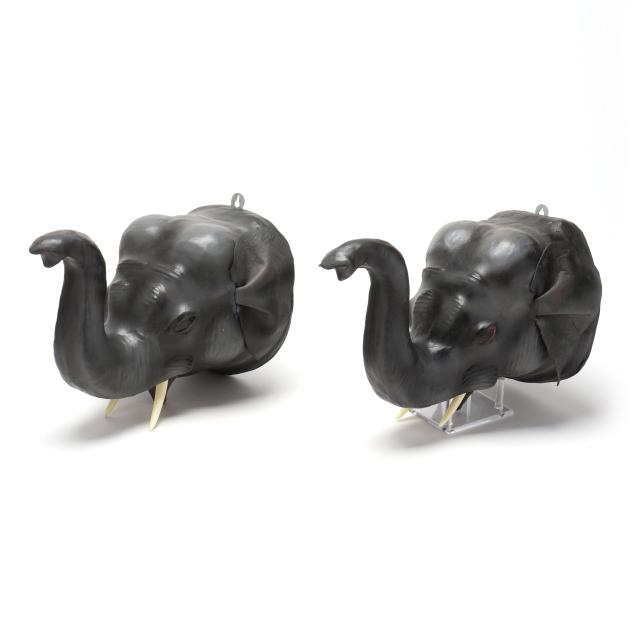 pair-of-leather-wrapped-elephant-head-wall-mounts
