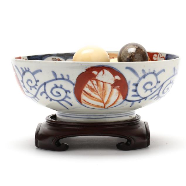 japanese-imari-porcelain-center-bowl-with-collection-of-hardstone-eggs