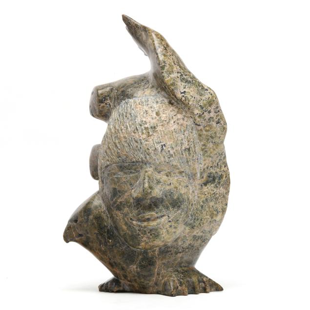 fanciful-inuit-sculpture-blending-human-and-animal-elements