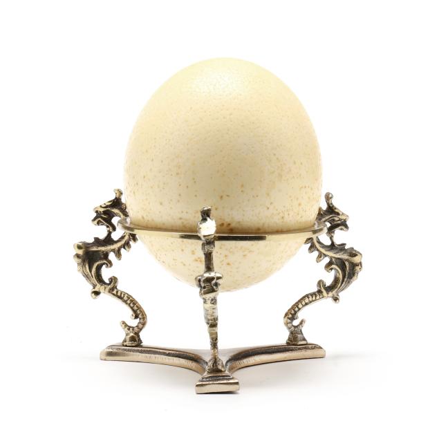 ostrich-egg-on-figural-brass-stand