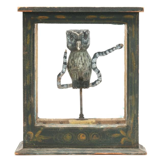 folk-carved-and-polychrome-cased-figure-of-owl-clutching-snake