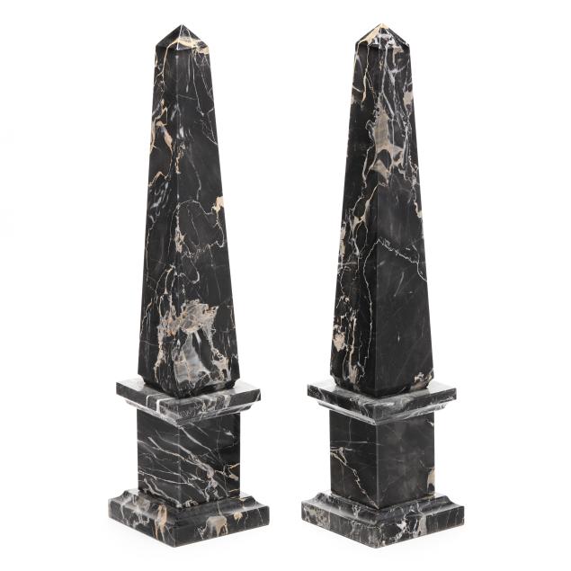 pair-of-polished-black-marble-obelisks-on-plinths