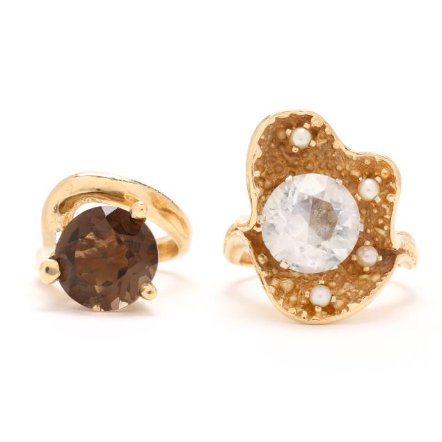 two-gold-and-gem-set-rings