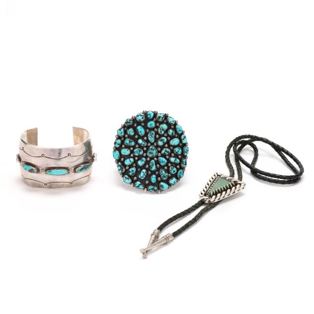 two-southwestern-silver-and-turquoise-cuff-bracelets-and-a-bolo-tie