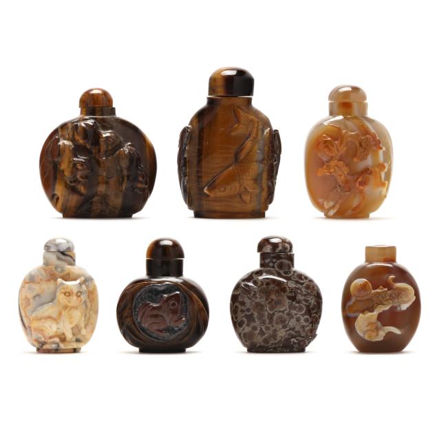a-group-of-chinese-brown-and-tan-hardstone-snuff-bottles