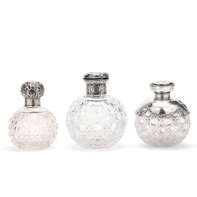 three-english-silver-mounted-crystal-scent-bottles