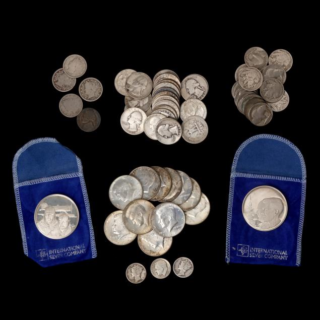 a-group-of-mostly-silver-coins-and-two-silver-medallions