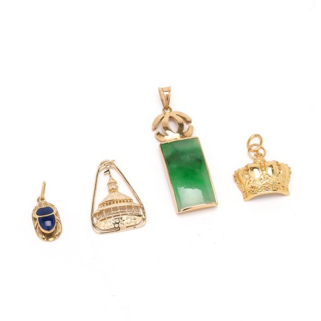 three-gold-charms-pendants-and-a-silver-charm