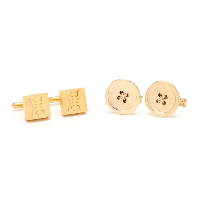 two-pairs-of-gold-cufflinks