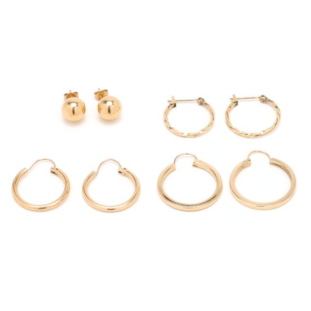 four-pairs-of-gold-earrings
