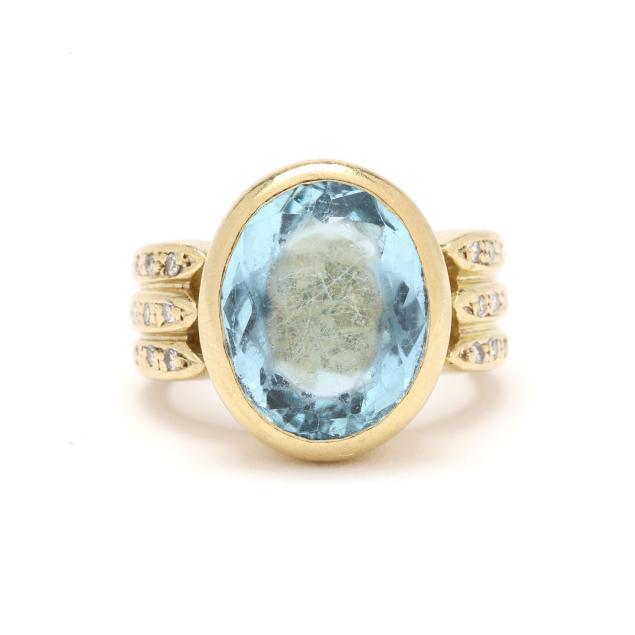 gold-blue-topaz-and-diamond-ring