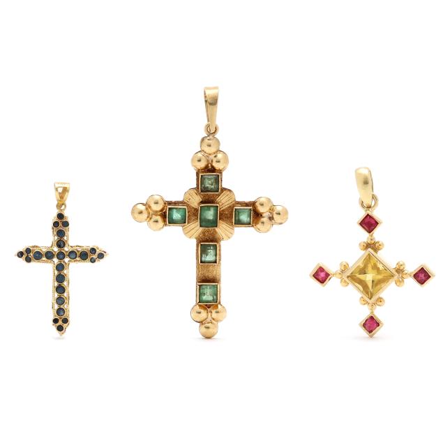 three-gold-and-gem-set-crosses