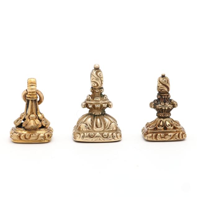 three-gold-and-hardstone-intaglio-watch-seal-fobs