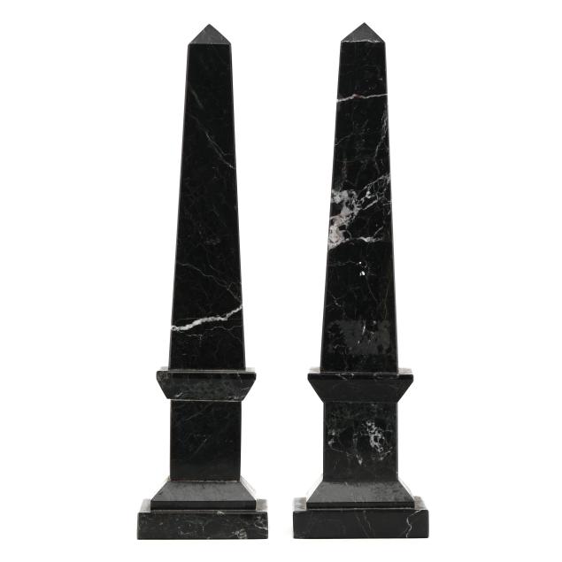 pair-of-black-marble-obelisks-on-plinths