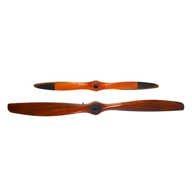 two-large-vintage-wooden-aircraft-propellers