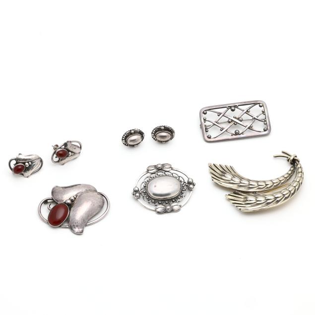 four-sterling-silver-brooches-and-two-pairs-of-silver-earrings-georg-jensen