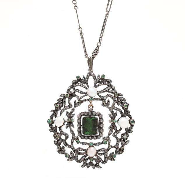 silver-topped-gold-and-gem-set-wreath-motif-pendant-with-a-fancy-silver-chain