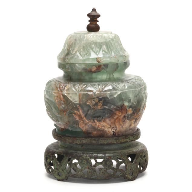 a-chinese-carved-green-stone-urn-with-lid-and-pedestal