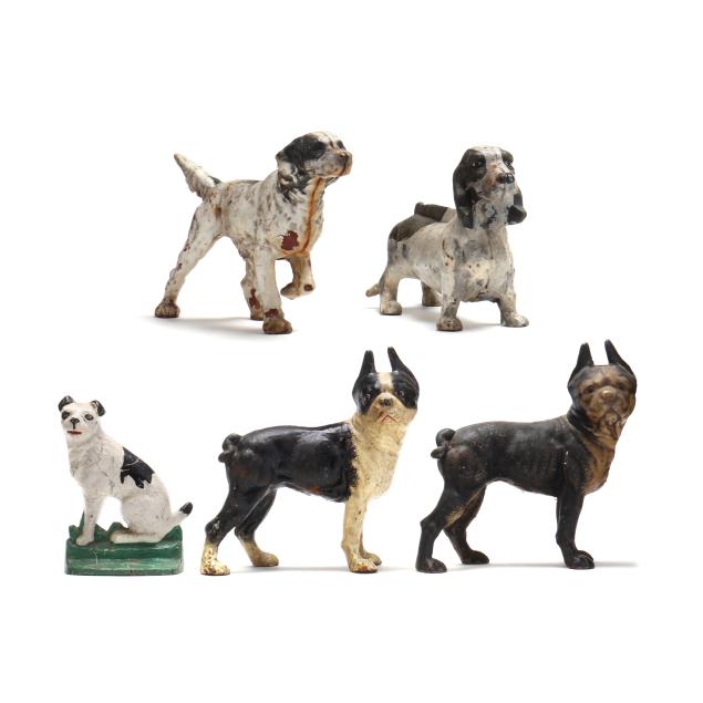 a-group-of-five-cast-iron-dog-doorstops