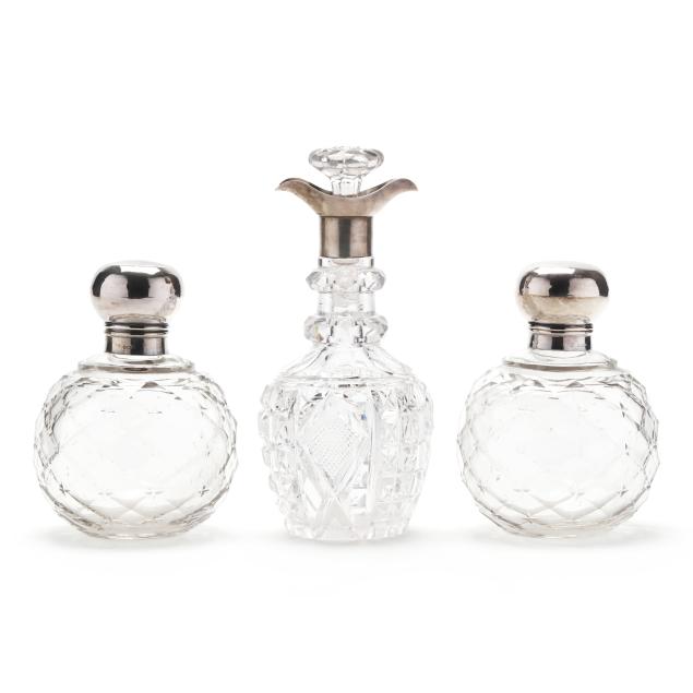 three-english-silver-mounted-glass-bottles
