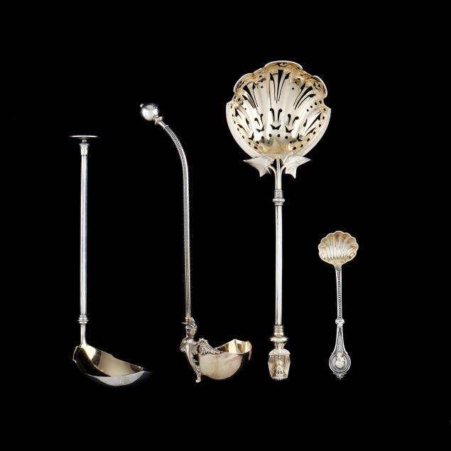 four-antique-american-silver-flatware-servers-with-gold-wash