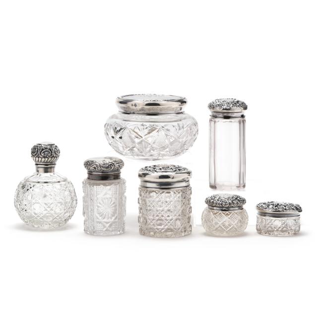 seven-sterling-silver-mounted-glass-dressing-bottles