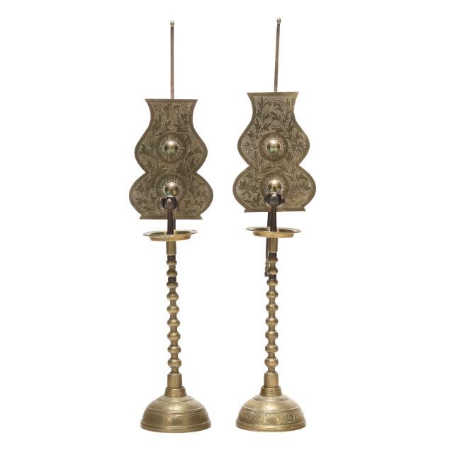 a-pair-of-tall-asian-brass-candleholders-with-reflectors
