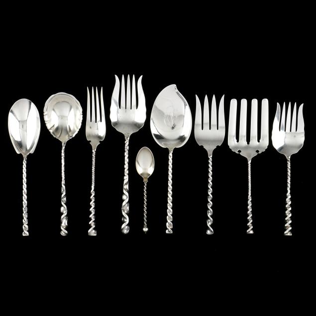 a-collection-of-nine-i-twist-i-handled-sterling-silver-servers