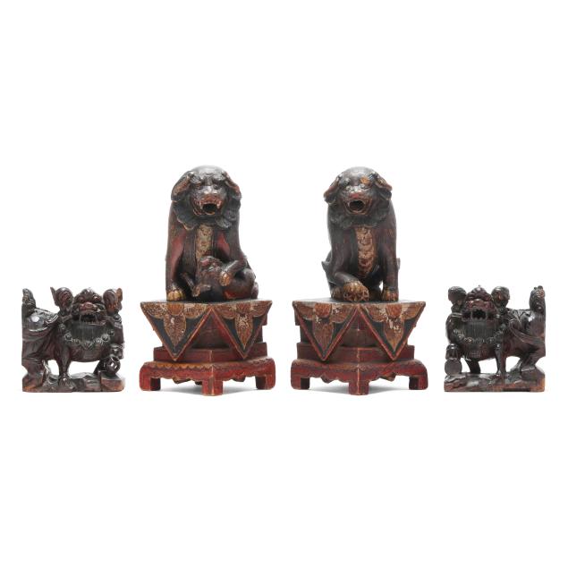 two-pairs-of-asian-carved-wood-foo-lions
