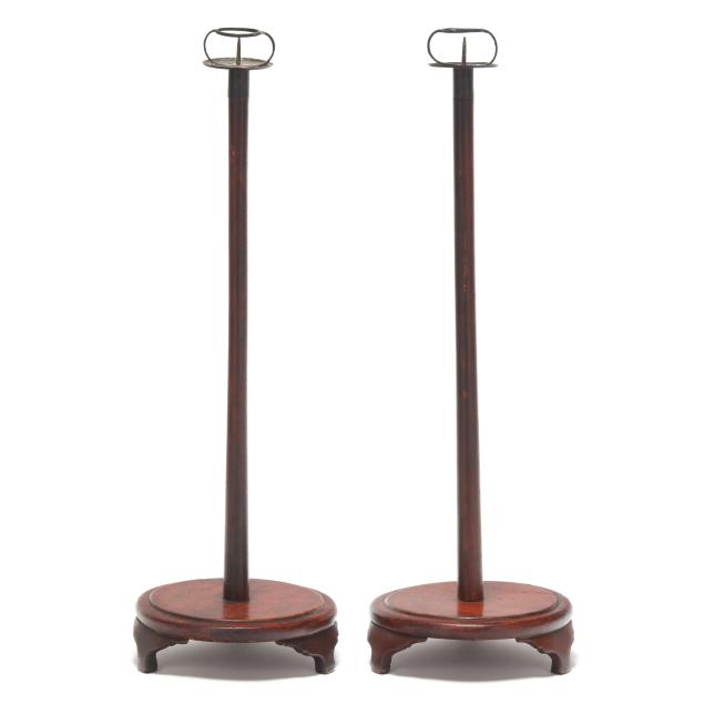 a-pair-of-tall-chinese-red-wash-wood-pricket-sticks