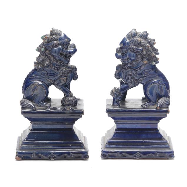 a-pair-of-chinese-porcelain-blue-glazed-buddhist-foo-lions