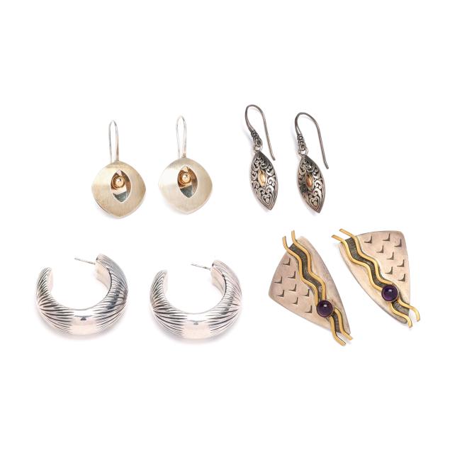 four-pairs-of-sterling-silver-earrings