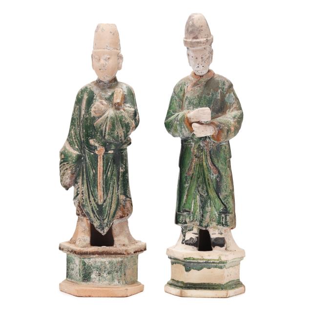 a-matched-pair-of-green-glazed-official-figures-on-octagonal-bases