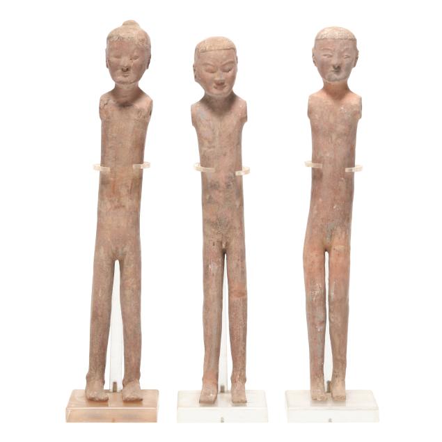 a-group-of-three-chinese-pottery-stick-figures