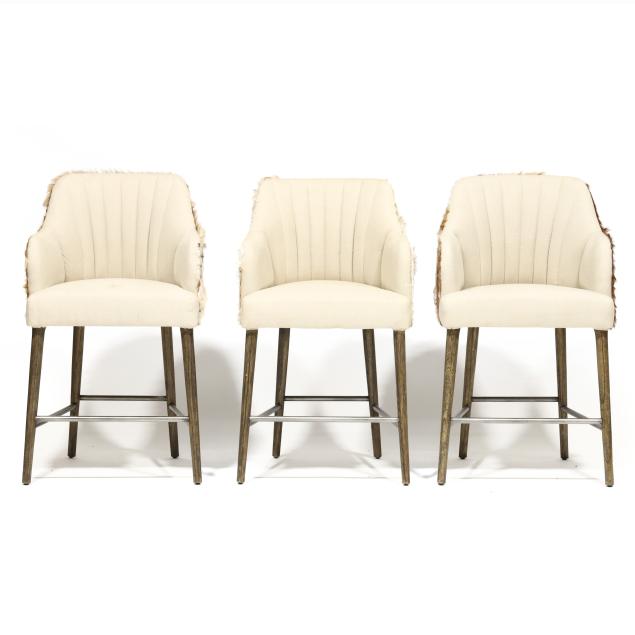 three-modern-barstools-in-hide-upholstery