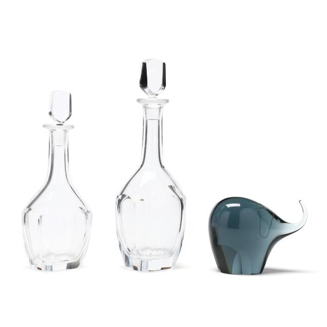 two-orrefors-crystal-decanters-and-an-elephant