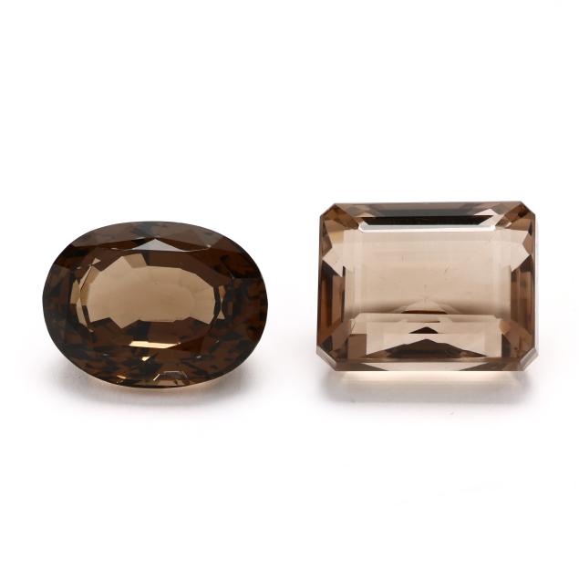 an-emerald-cut-and-an-oval-cut-loose-smoky-quartz