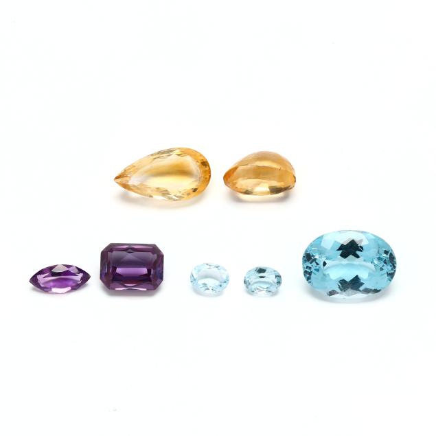 a-group-of-seven-loose-gemstones
