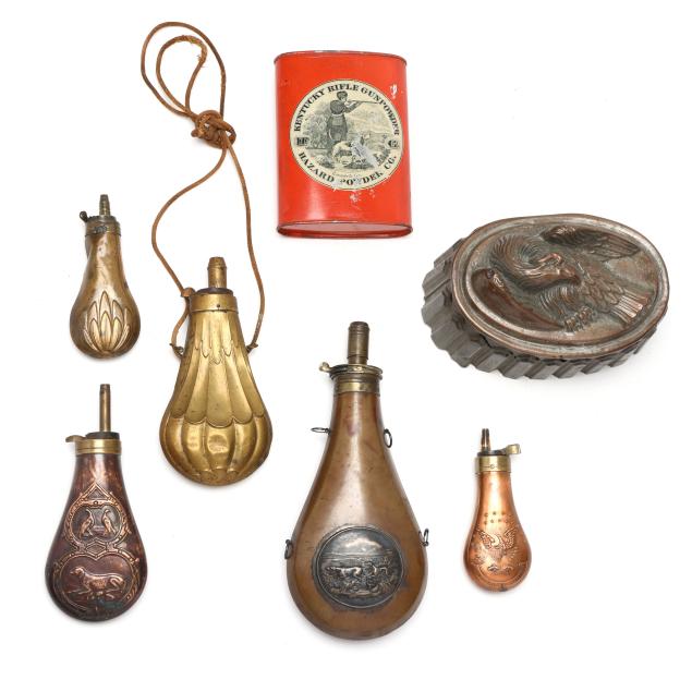 collection-of-copper-and-brass-gunpowder-flasks-with-eagle-mold